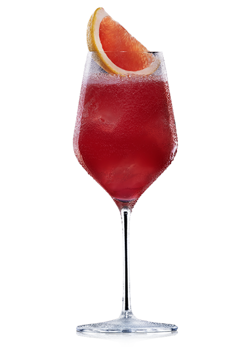Weinglas mit rosafarbendem Aperitif und Grapefruitspalte.